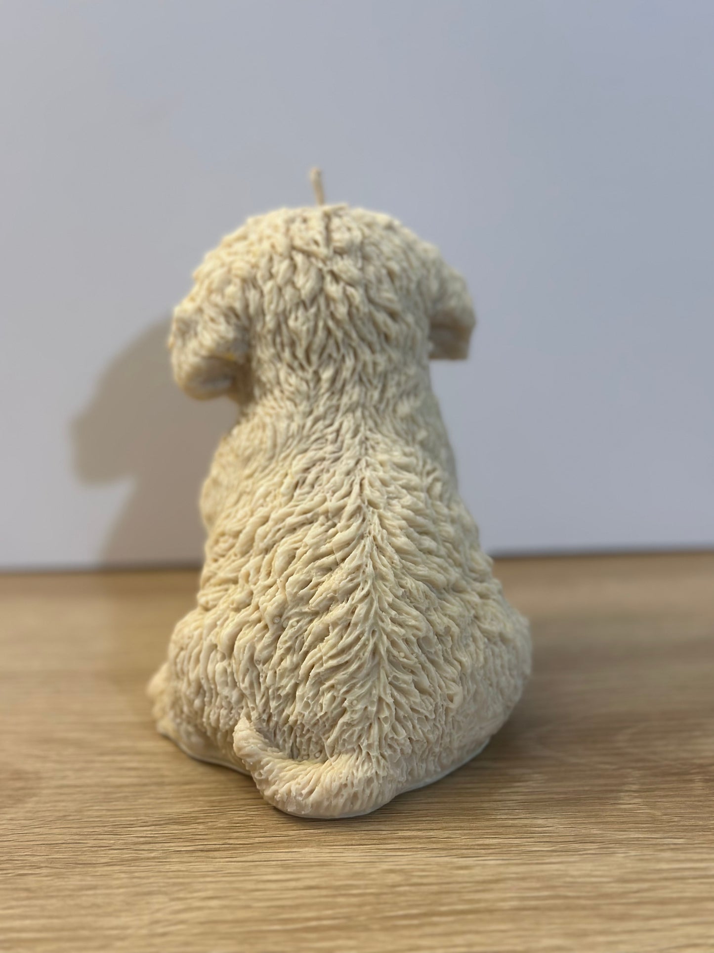 Beige puppy candle
