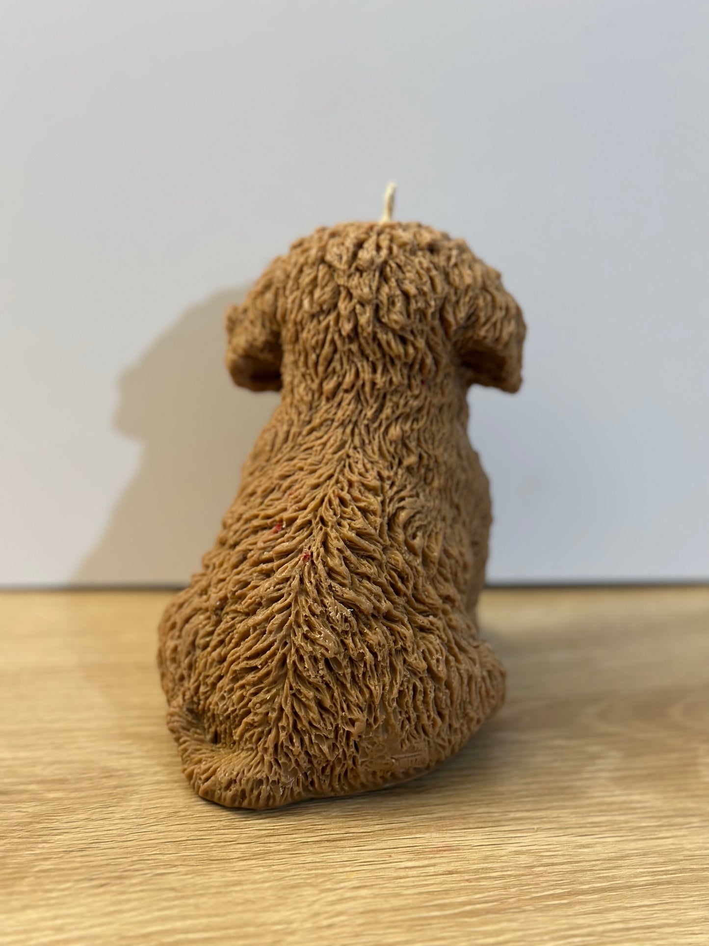 Brown puppy candle