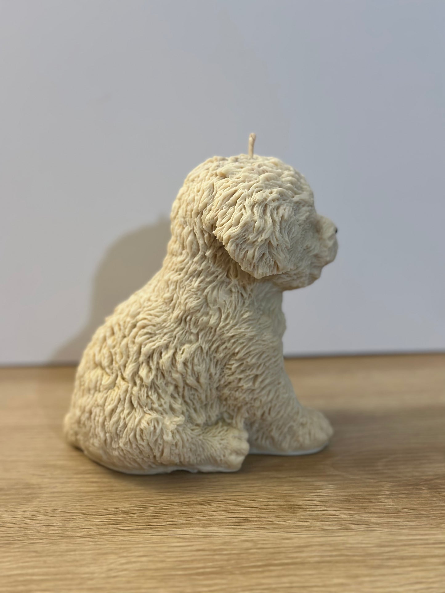 Beige puppy candle